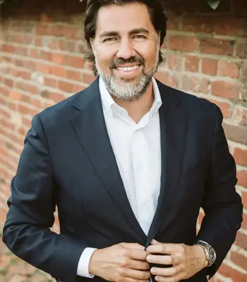 Portrait of Andre Perez, Executive VP & Associate Broker.